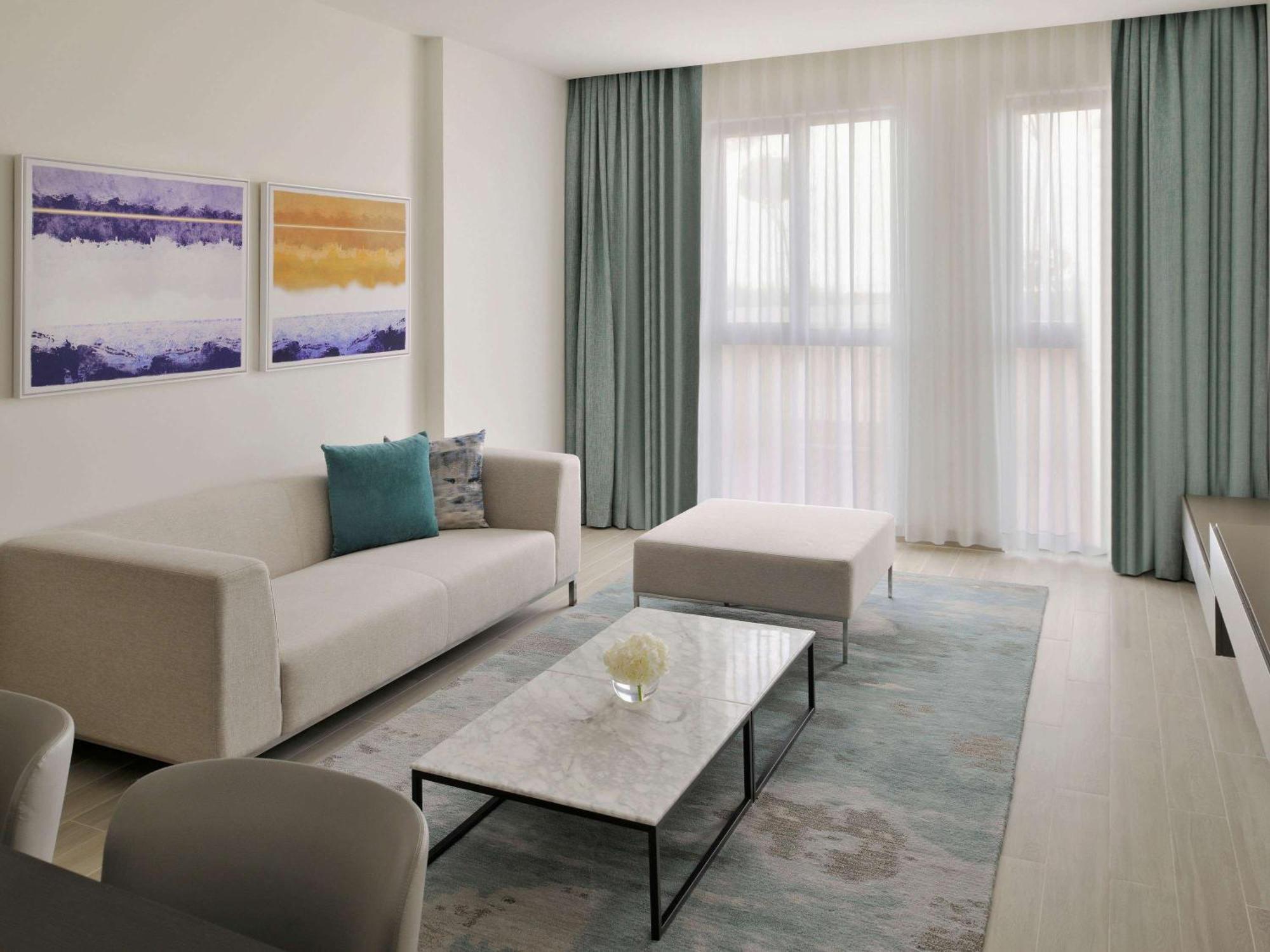 Moevenpick Hotel & Apartments Ghala Maskat Dış mekan fotoğraf A living room