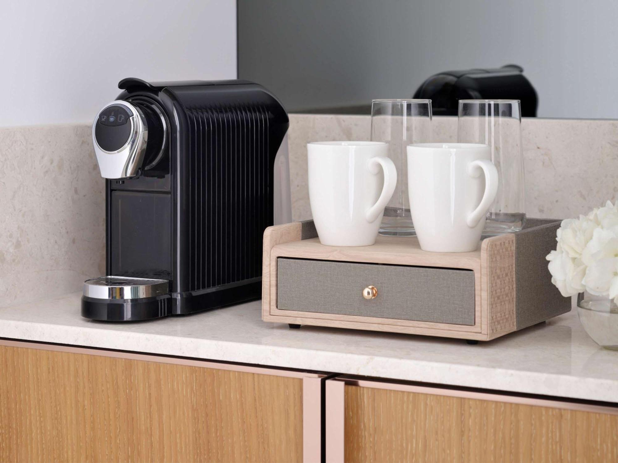 Moevenpick Hotel & Apartments Ghala Maskat Dış mekan fotoğraf A Nespresso coffee machine