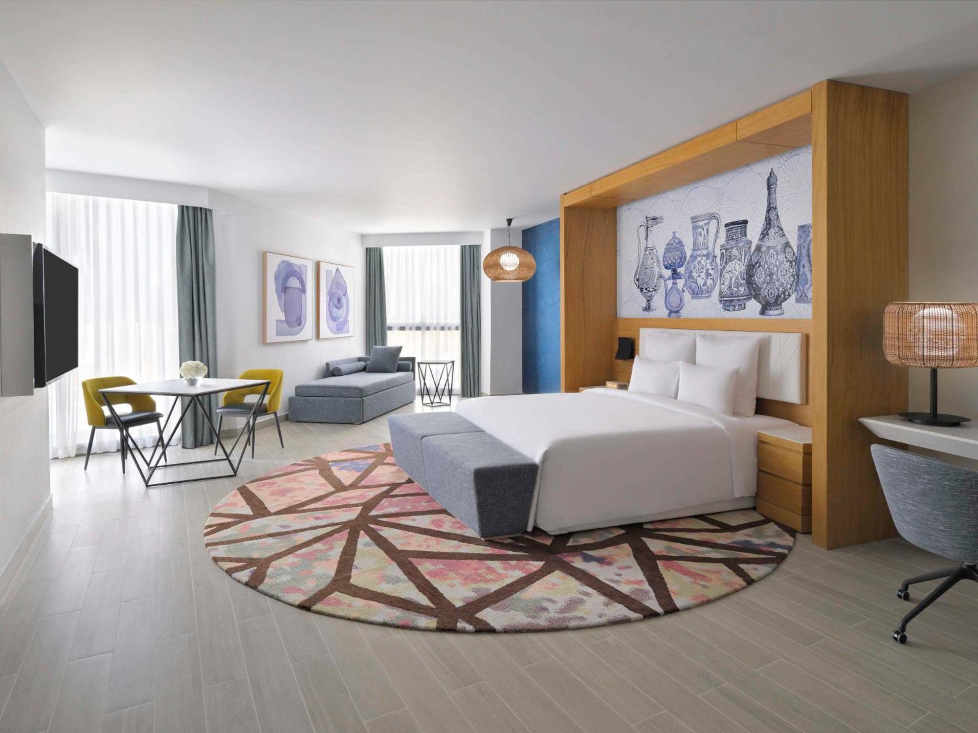 Moevenpick Hotel & Apartments Ghala Maskat Dış mekan fotoğraf A room at the hotel